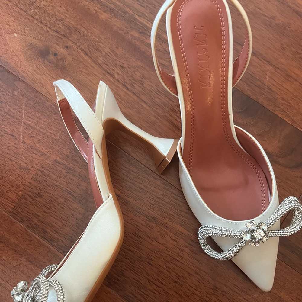 Brand new white slingbacks size 39 fits like 8